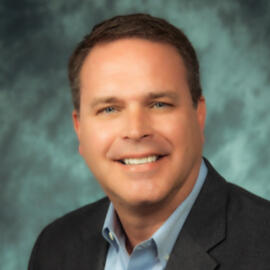 John Scandrett VP/CMO